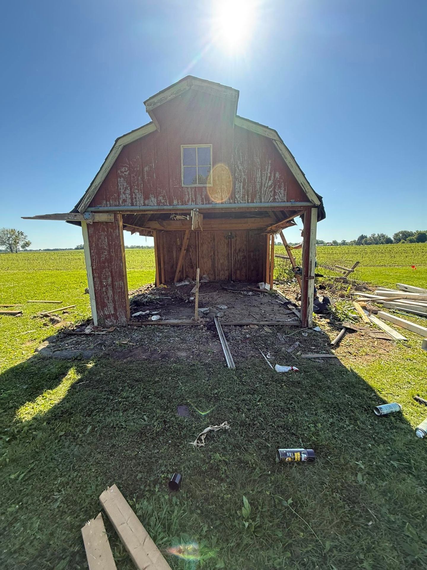 Backyard shed demolition in progress by Gone Today Hauling in Central Indiana