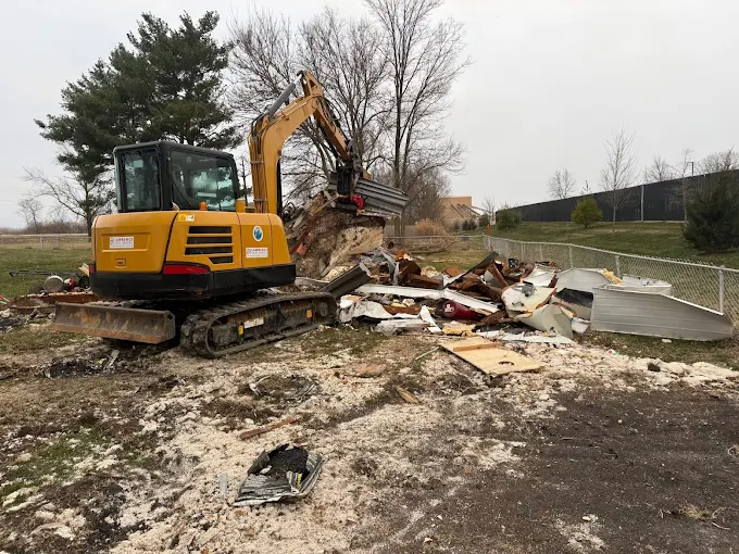 Construction debris being loaded into a trailer at a Central Indiana jobsite by Gone Today Hauling