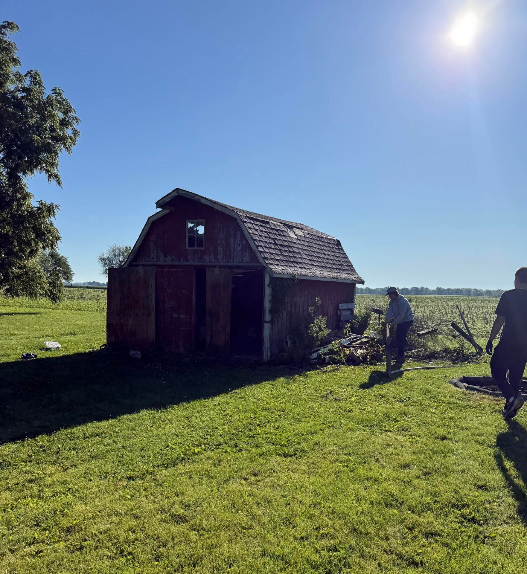 Before — original weathered barn scheduled for demolition
